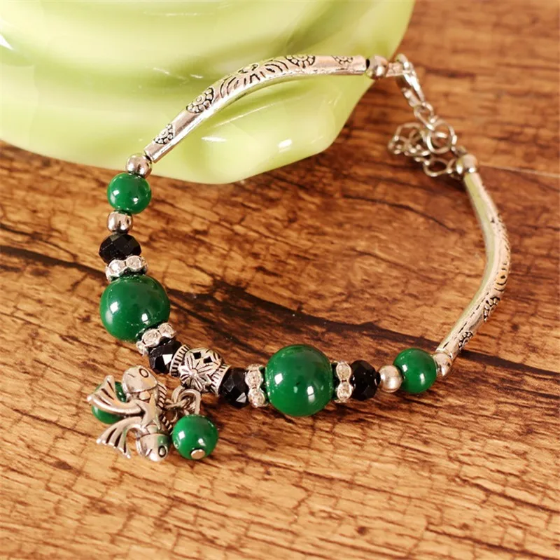 Браслет в этническом стиле Джокер с разноцветными рыбками и бусинами модные