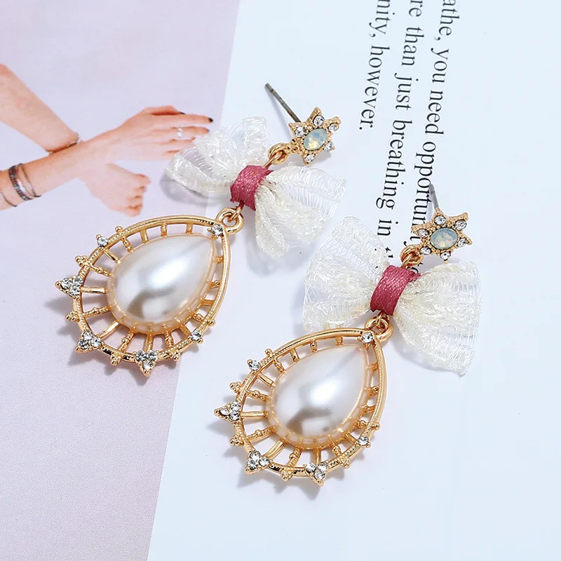 Полые капли воды Длинные Висячие Серьги Свадебная вечеринка Crystal Pearl Bowknot Модные