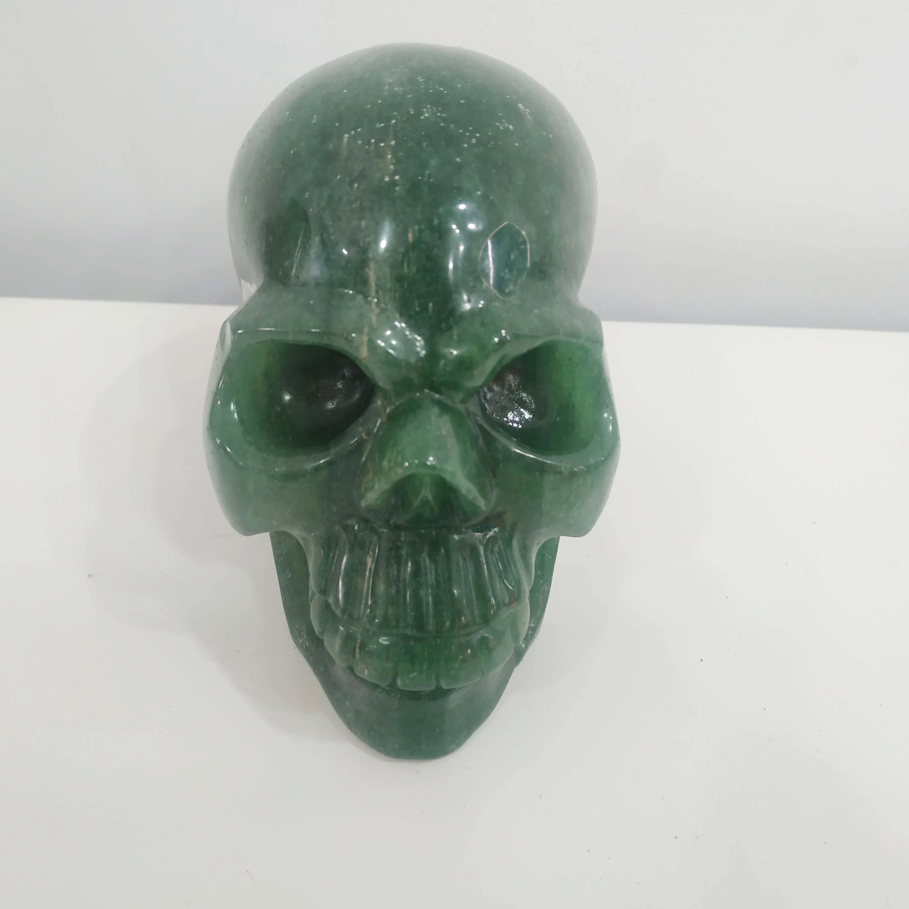 

Natural crystal skull green stawberry quartz stone carving handicraft