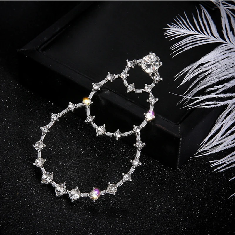 Серьги-подвески женские массивные с круглыми кристаллами