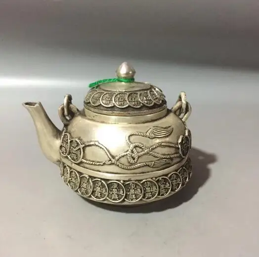 

Коллекционный заварочный чайник из белой меди и золота
