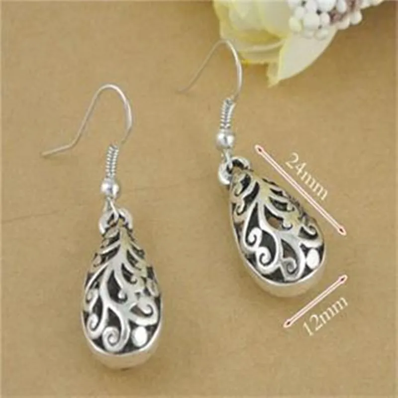 

Vintage Tibet silver carved Tibetan silver drop earrings for women perspective