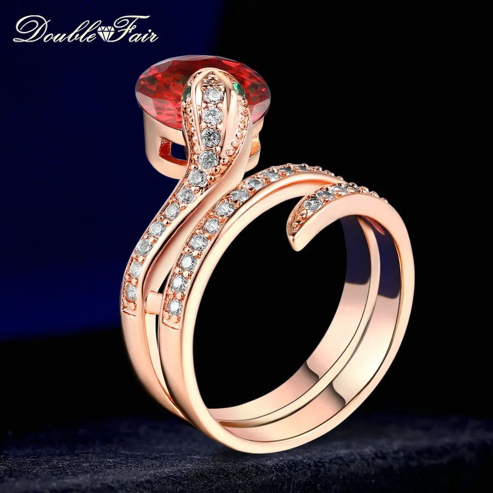 Двойное ярмарочное Брендовое кольцо с красным кристаллом покрытое фианитом цвет