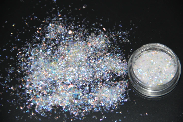 Переливающиеся фиолетовые зеленые цветные ледяные белые майларовые листовые