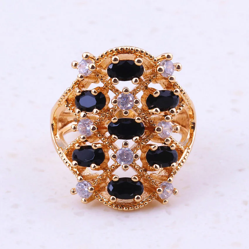 Кольцо женское золотистое с фианитом и черным кристаллом | Украшения аксессуары