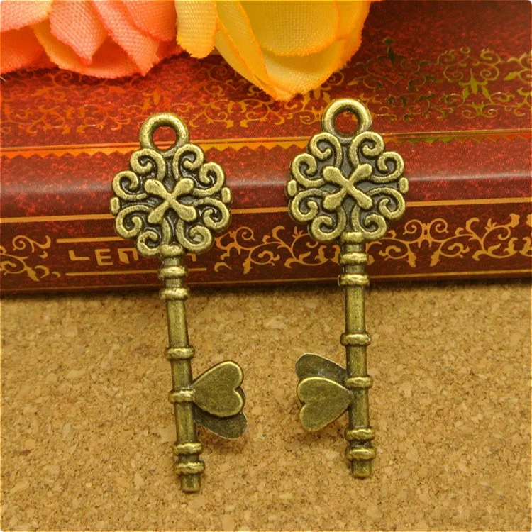 

High Quality 20 Pieces/Lot 34mm*11mm Antique Bronze Plated Vintage heart Key Charm