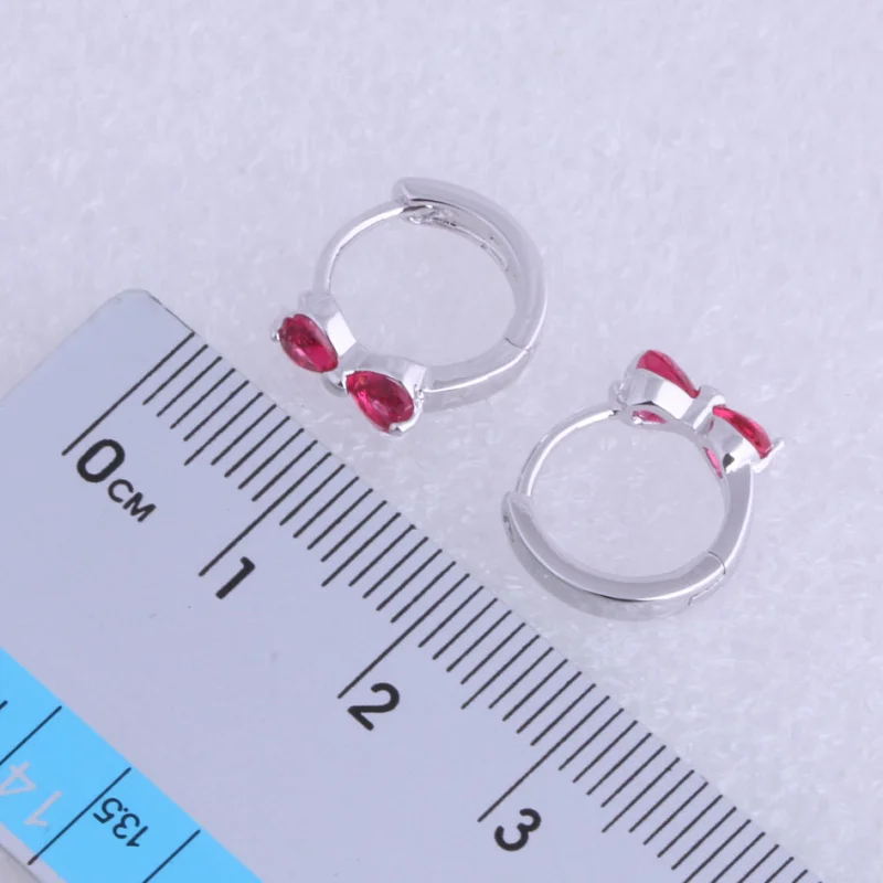 Женские серьги-кольца с красной розой серебристые бантом X0459 Любовный монолог |