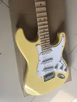 Factory custom milk yellow electric guitar and scallop Maple neck, 3 S pickup, big bed box, provide customized,