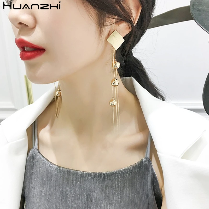 Женские серьги-подвески HUANZHI с длинными кисточками и золотыми бусинами из