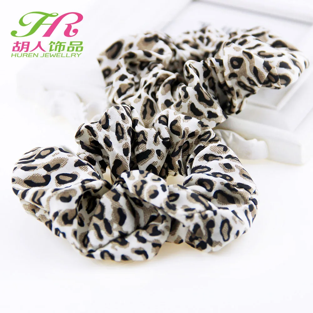 Женские аксессуары для волос в стиле леопардового принта и полоски на резинке для хвоста или косы.