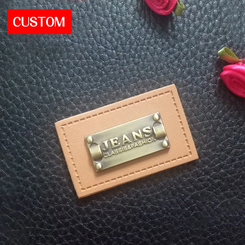 

Заводские индивидуальные металлические этикетки из искусственной кожи с тиснением логотипа для пришивания на одежду, ручная работа