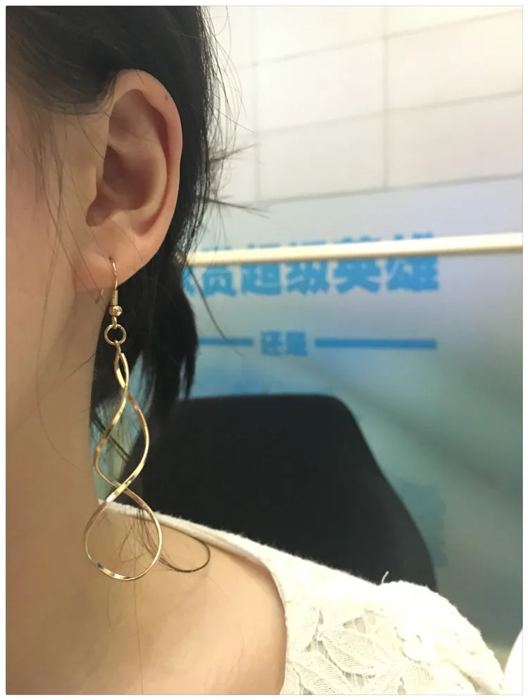 

The New Minimalist Spiral Curled Silver Earrings, Design Sense Of Wave Curve Gold Drop Earrings Female Jewelry Long Earrings