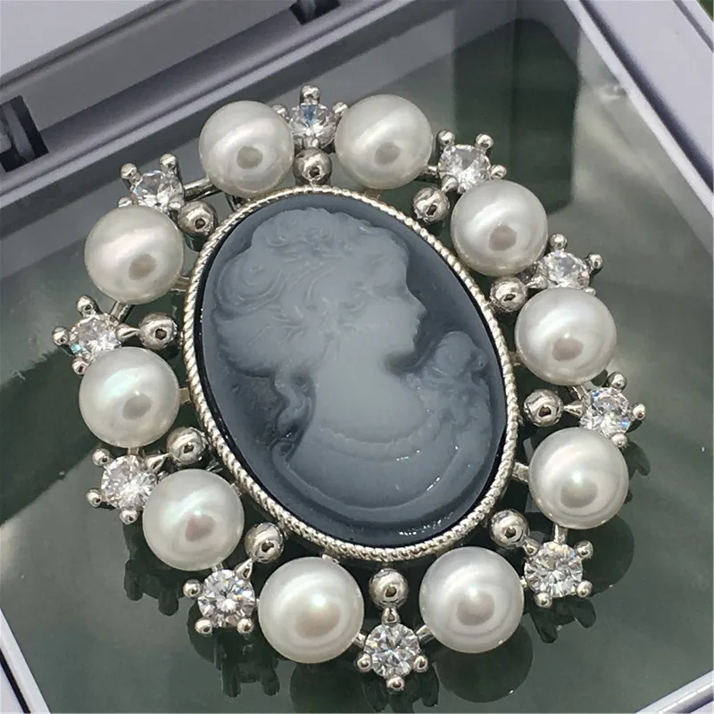 

wholesale New natural freshwater pearl shells beautiful head brooch pendant
