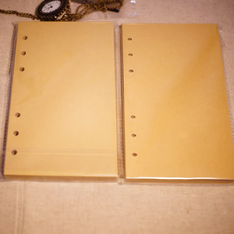 

Standard A6 size sketch notebook inside 60 page paper kraft have 6 holes on paper fit notebook for losse leaf leather notebook