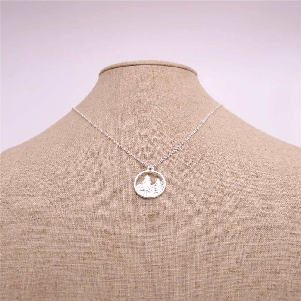 

Trendy hollow out circle pendant necklace Christmas trees pendant necklace for women