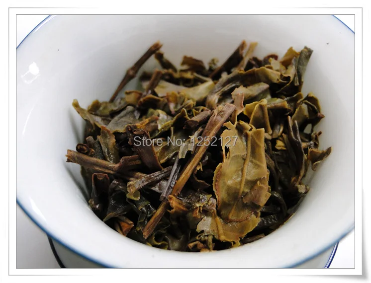 Free shippig 280g raw green pu-erh tea cake 4years aged |