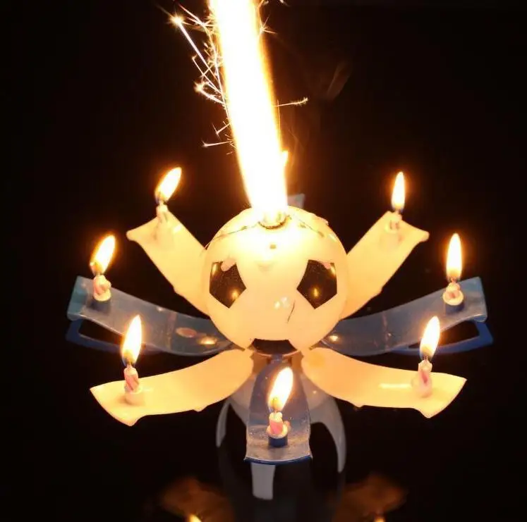 Музыкальный вращающийся Вращающийся футбольный футбол день рождения фотография