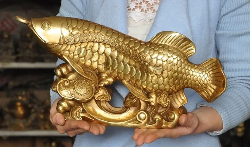 

A copper brass ornaments arowana. Lucky fish. The best fish business