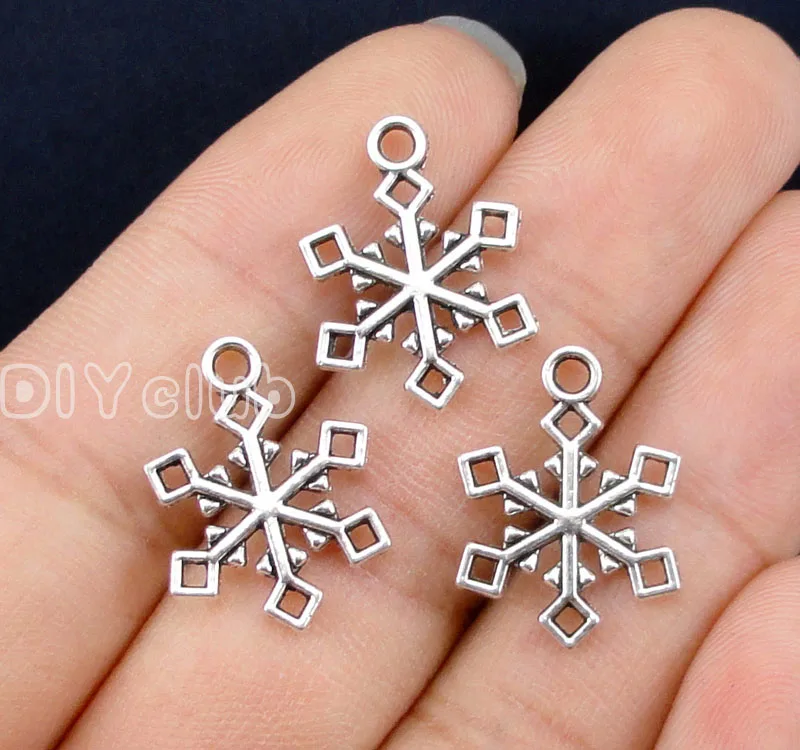 

100pcs-Antique серебро очаровательные снежинки на Рождество кулон 2-сторонний 20x15mm