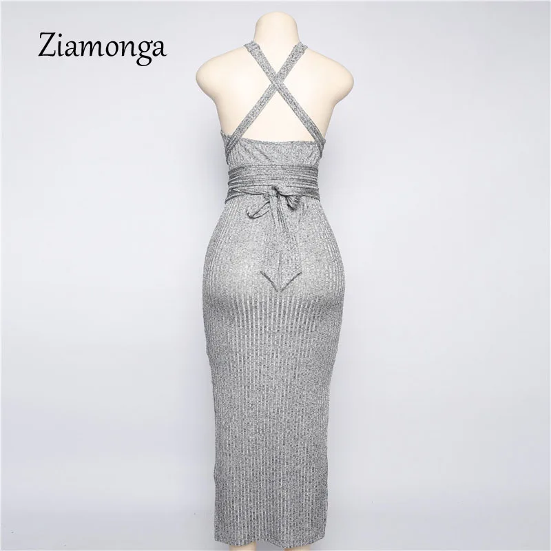 Женское облегающее платье с лямкой вокруг шеи открытой спиной и открытыми