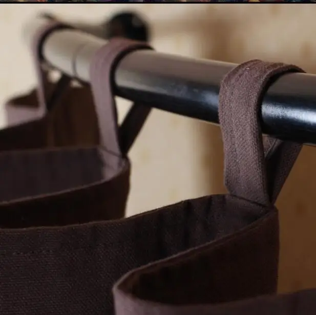

An easy to remove cotton and linen canvas printing DIY in the corner dressing room of iron art clothing store