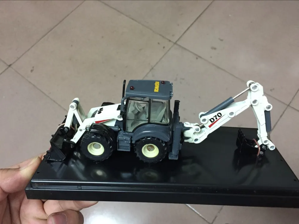 

Rare Komatsu D70 Centre Pivot Backhoe Loader White 1/50 Scale Die-Cast Model