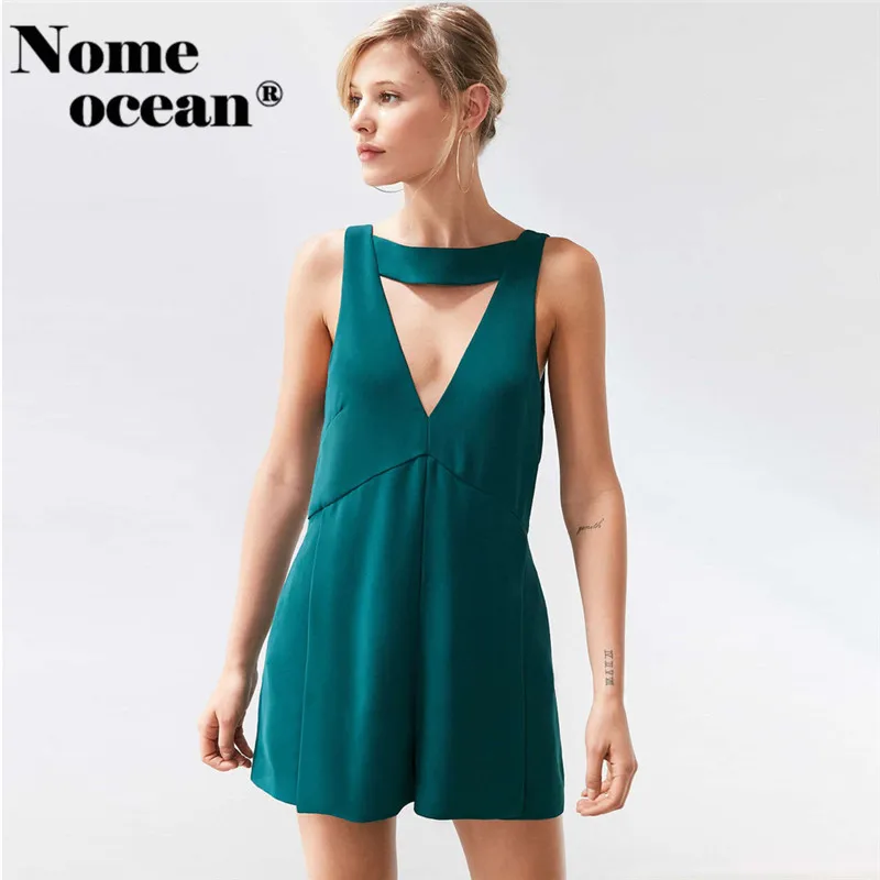 Сексуальный комбинезон чокер с вырезами боковыми карманами широкими штанинами