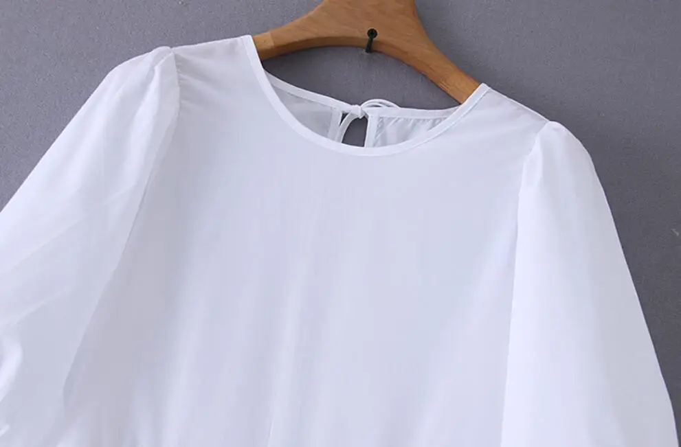 Однотонное женское платье миди с асимметричным подолом свободное круглым