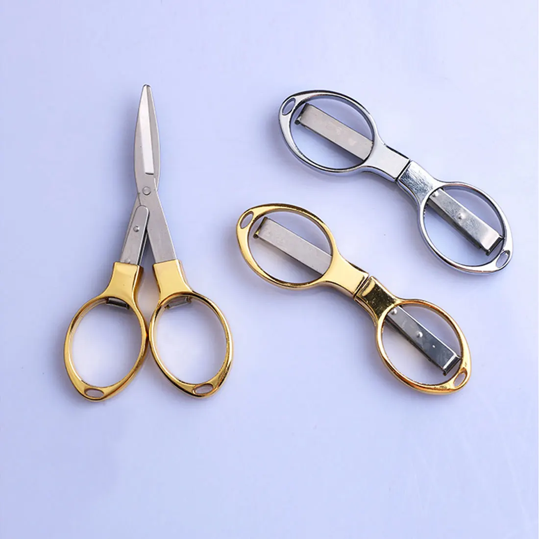 

Mini Stainless Steel Folding Keychain Fishing Scissors Blister card package