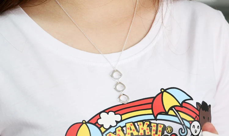 Ожерелье с кулоном в виде геометрических фигур отверстиями | Украшения и