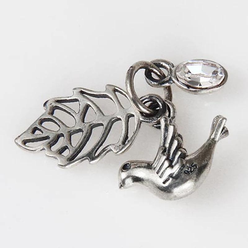 Подвеска-Голубь из серебра 100% пробы с австралийским хрустальным яйцом |