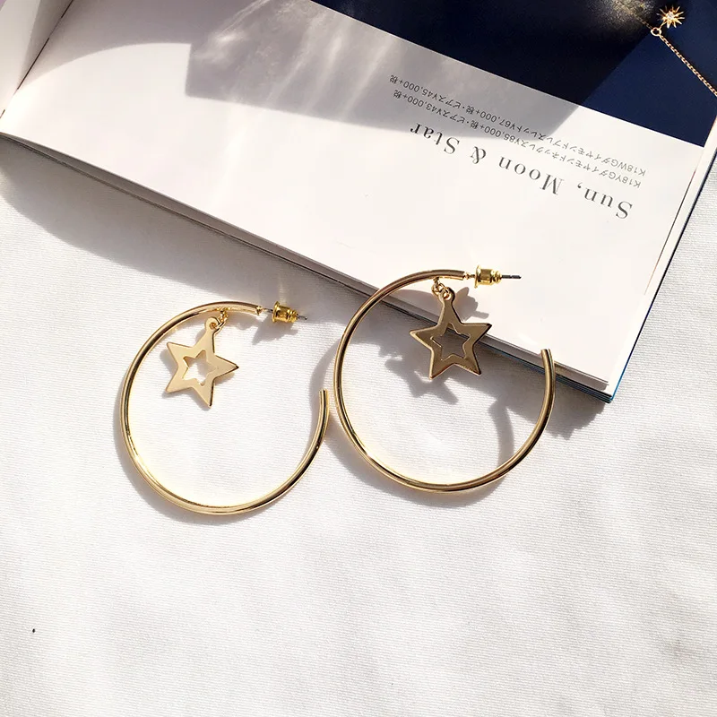 Женские круглые серьги гвоздики в форме звезды эффектные вечерние из сплава