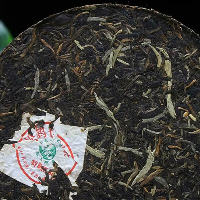 Xiaguan 2013 Sheng Pu-erh Song He Qizi Железный торт сырой чай Пуэр Специальный класс 357 г
