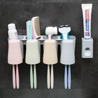 hs050 fashion family toothbrush holder wall mounted toothbrush rack wash suit with automatic toothpaste extruder