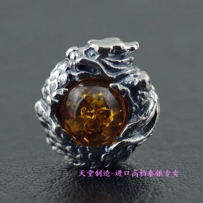 

Серебряные серьги-гвоздики с китайским драконом