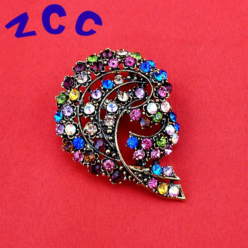 Винтажная под старину с бронзовым покрытием разноцветными вставками хрусталя