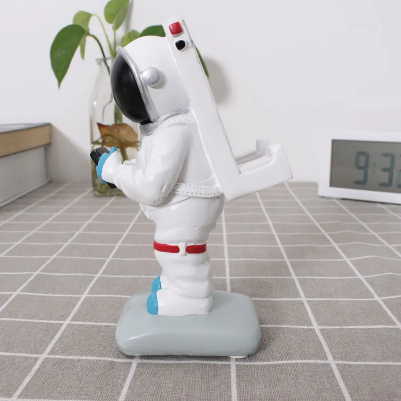 Межзвездное астронавт держатель телефона StandPhone Поддержка Spaceman Универсальный