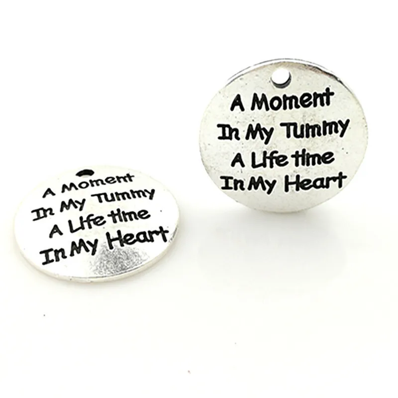 

2021 Hot selling 10 pcs/Lot 25mm Antique Silver colour letter printed a moment in my tummy charm round disc message charms