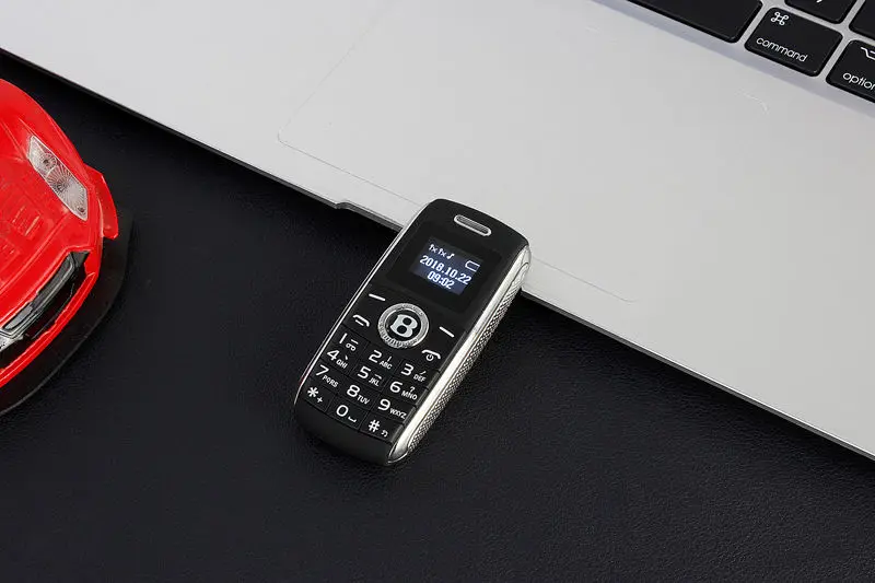 Разблокированный мини мобильный телефон, Bluetooth, набор номера, 0,66 дюймов, с ручками, мини телефон, MP3, волшебный голос, две sim-карты, маленький сотовый телефон