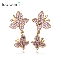 luoteemi new delicate animal stud earrings champagne white gold color cubic zirconia double butterfly brincos for women jewelry