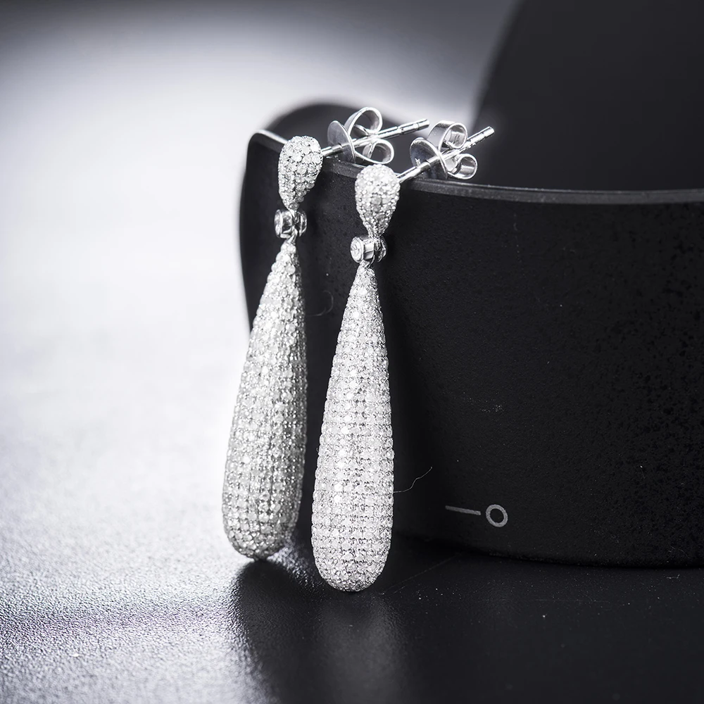 Женские серьги 14kt длинные золотистые для продажи расположенные в двух