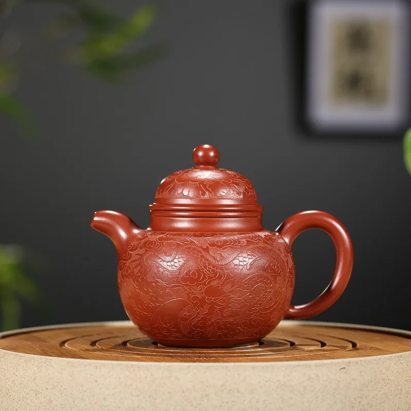 

Yixing recommended dahongpao hand carved dragon Duo ball pot famous recommended a undertakes to wechat business agent