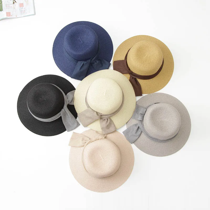

Free shipping High Quality Women Summer colors cap foldable paper hand made straw sun hat wide brim Bow beach cap Floppy Chapeau