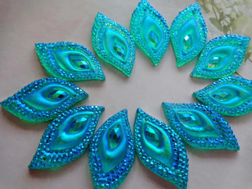 

Light blue AB colour sew on rhinestones Eye navette shape flatback 16*30mm resin crystal gemstones for dress 50pcs/lot