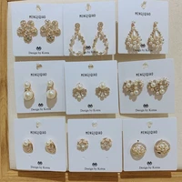 mengjiqiao 2019 fashion new simulated pearl flower stud earrings for women sweet bijoux cute heart cricle rhinestone oorbellen