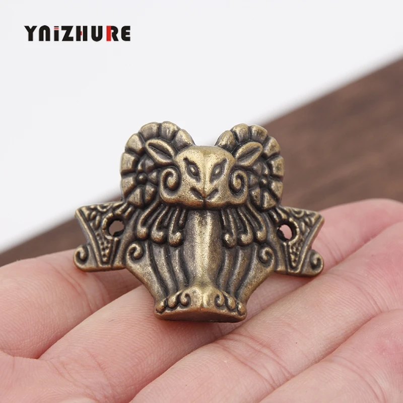 10pcs 43x34mm Zinc alloy horn Sheep head corner Imitation Feet Decorated Wooden Boxes Fixed Support Legs Corner Decorative Metal |