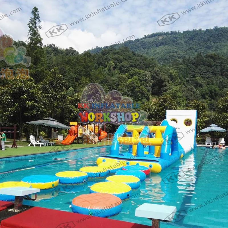 Koop 0.9Mm Pvc Drijvende Commerciële Opblaasbare Waterglijbaan Park