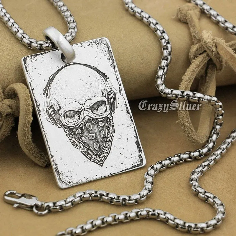Мужской кулон в виде черепа из серебра 925 пробы с гравировкой | Украшения и
