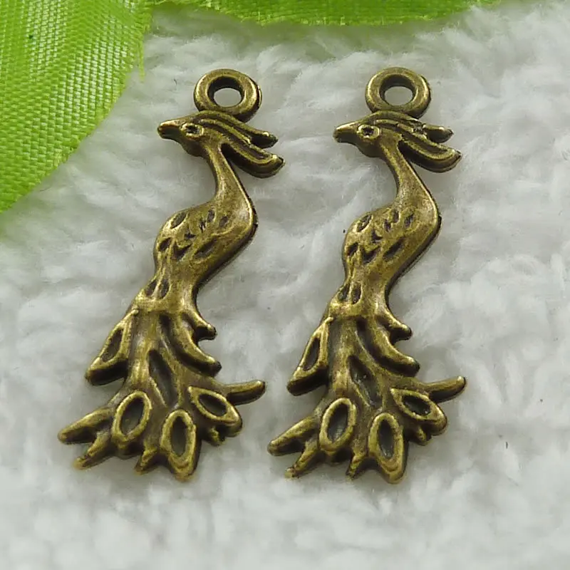 200 pieces antique bronze peacock charms 32x12mm #781 | Украшения и аксессуары