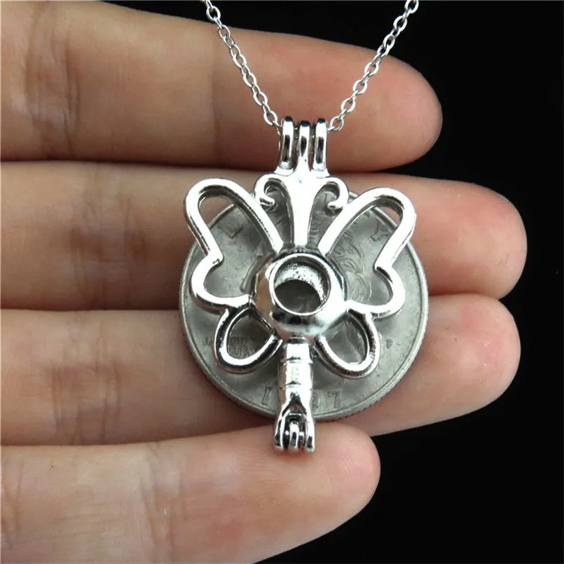 Сердце пистолет Бабочка бусины с насекомыми клетка плавающей медальон Ожерелье